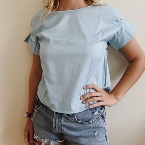 Baby Blue Ruffle Sleeve Dip Hem Top